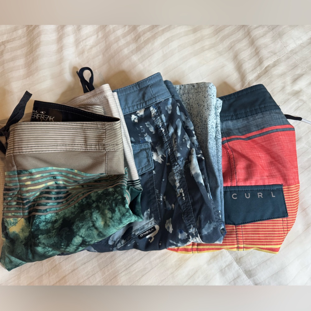 Lot of 3 Board shorts. Rip Curl and O’Neil- Multicolor Board Shorts Set